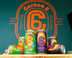 Image of Carbon 6 beer cans showcasing vibrant designs and branding related to brewer production lead job.