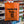 Stolen tote bag in orange with the text 'I stole this from...' displayed, set among beer cans from Carbon 6 Brewing.